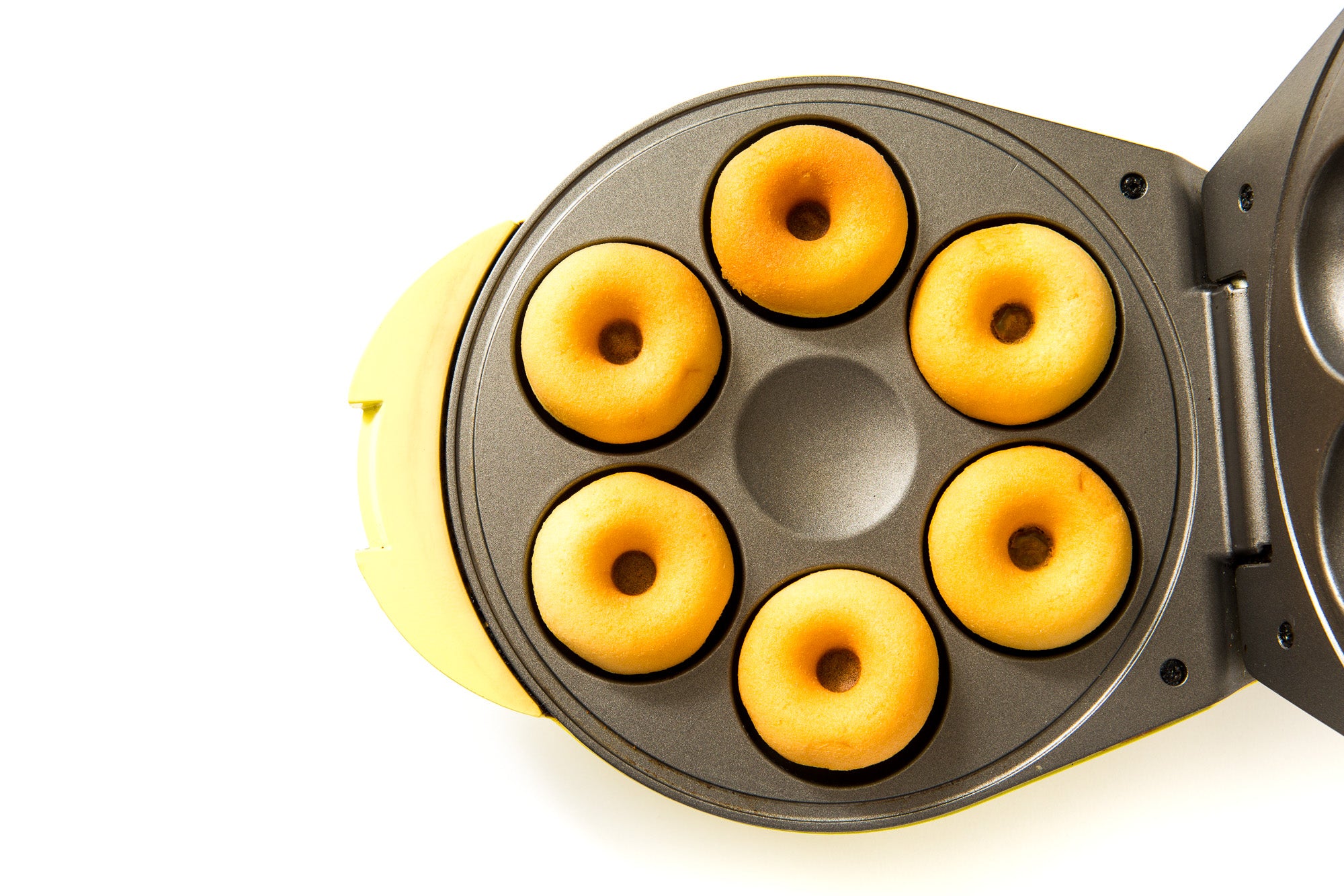 Image of the top of six donuts in a donut maker for Miss Jones Baking Co Lemonade Donuts