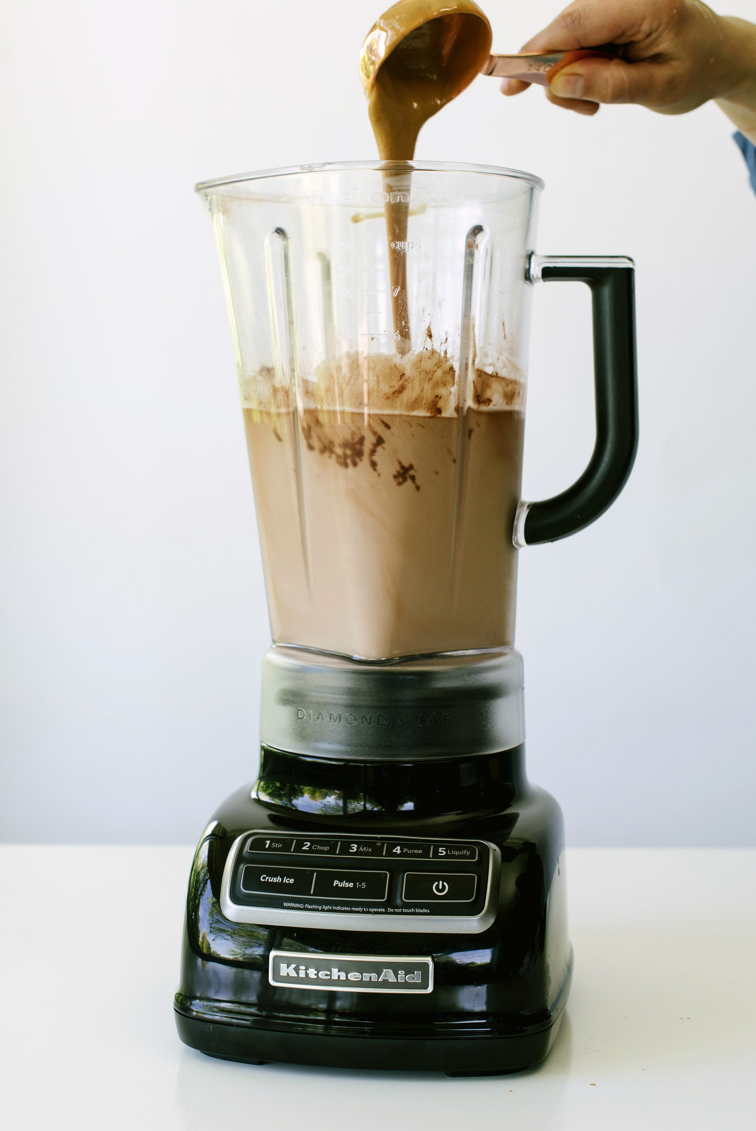 Nice cream in a blender used for Miss Jones Baking Co Chocolate Cake Batter Peanut Butter Nice Cream recipe