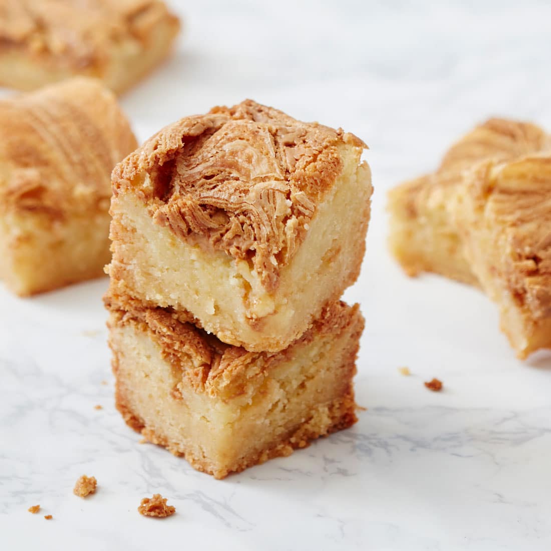 A stack of 2 of Miss Jones One-Bowl Cookie Butter Gooey Butter Bars