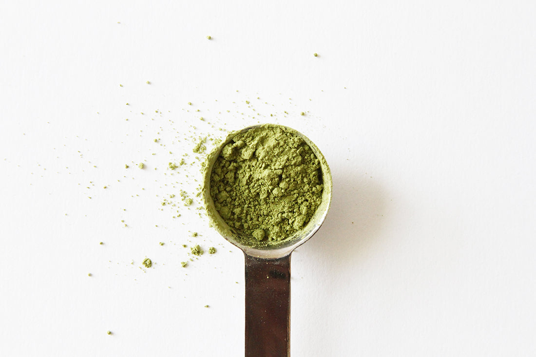 Image of a measuring spoon of matcha for Miss Jones Baking Co Matcha Tea Cakes recipe