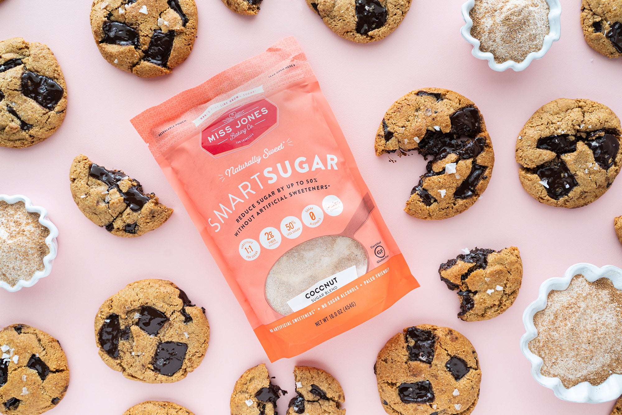 Image from above of Miss Jones Baking Co Paleo Chocolate Chip Cookies surrounding a bag of SmartSugar Coconut Sugar Blend