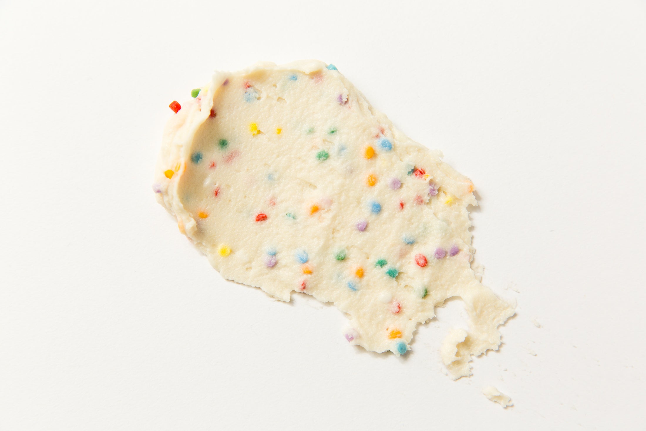 Image of top of Miss Jones Baking Co Confetti Pop Frosting spread on surface