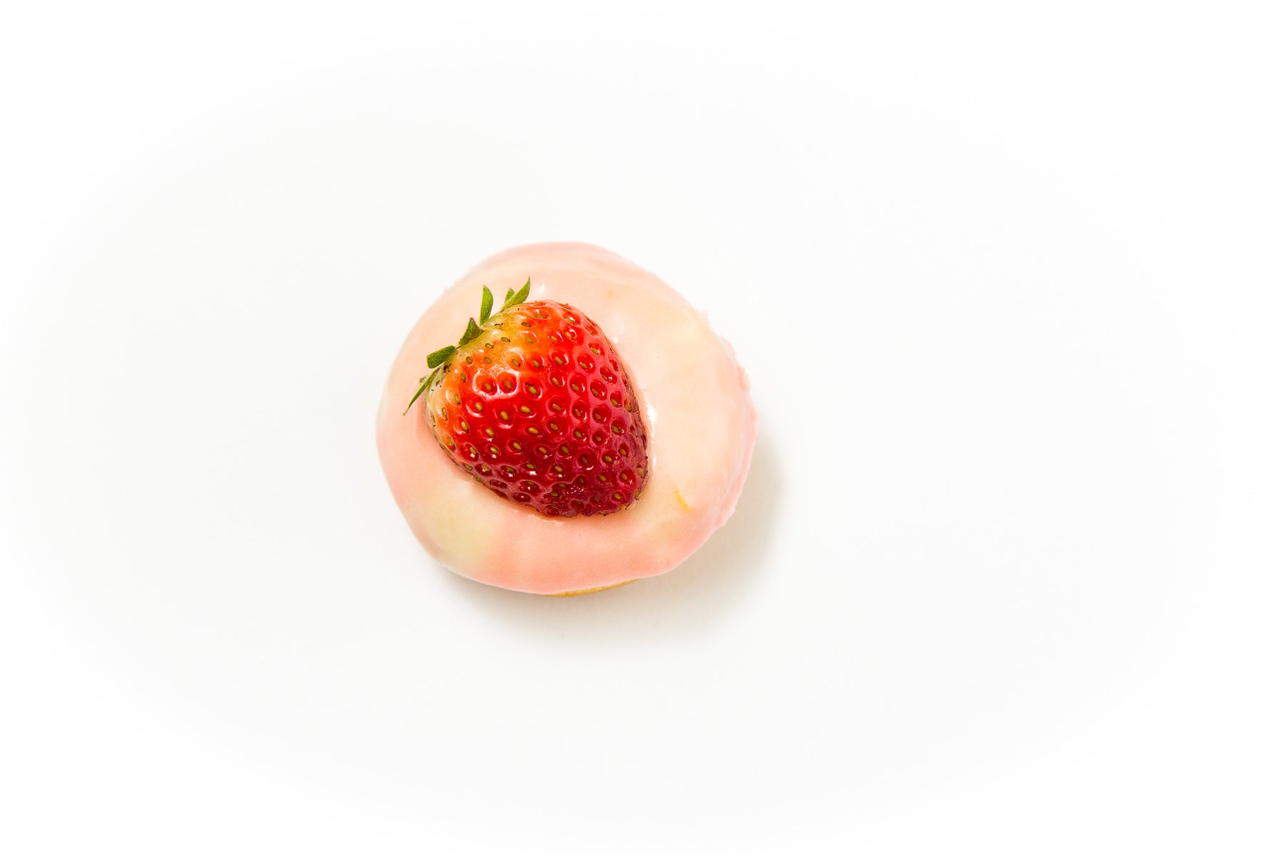 Image of the top of a Miss Jones Baking Co Strawberry Buttermilk Donut