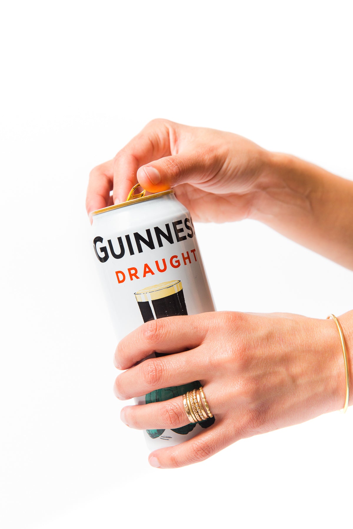 Image of hands opening a can of Guinness Draught for Miss Jones Baking Co Guinness Glazed Chocolate Donuts Recipe