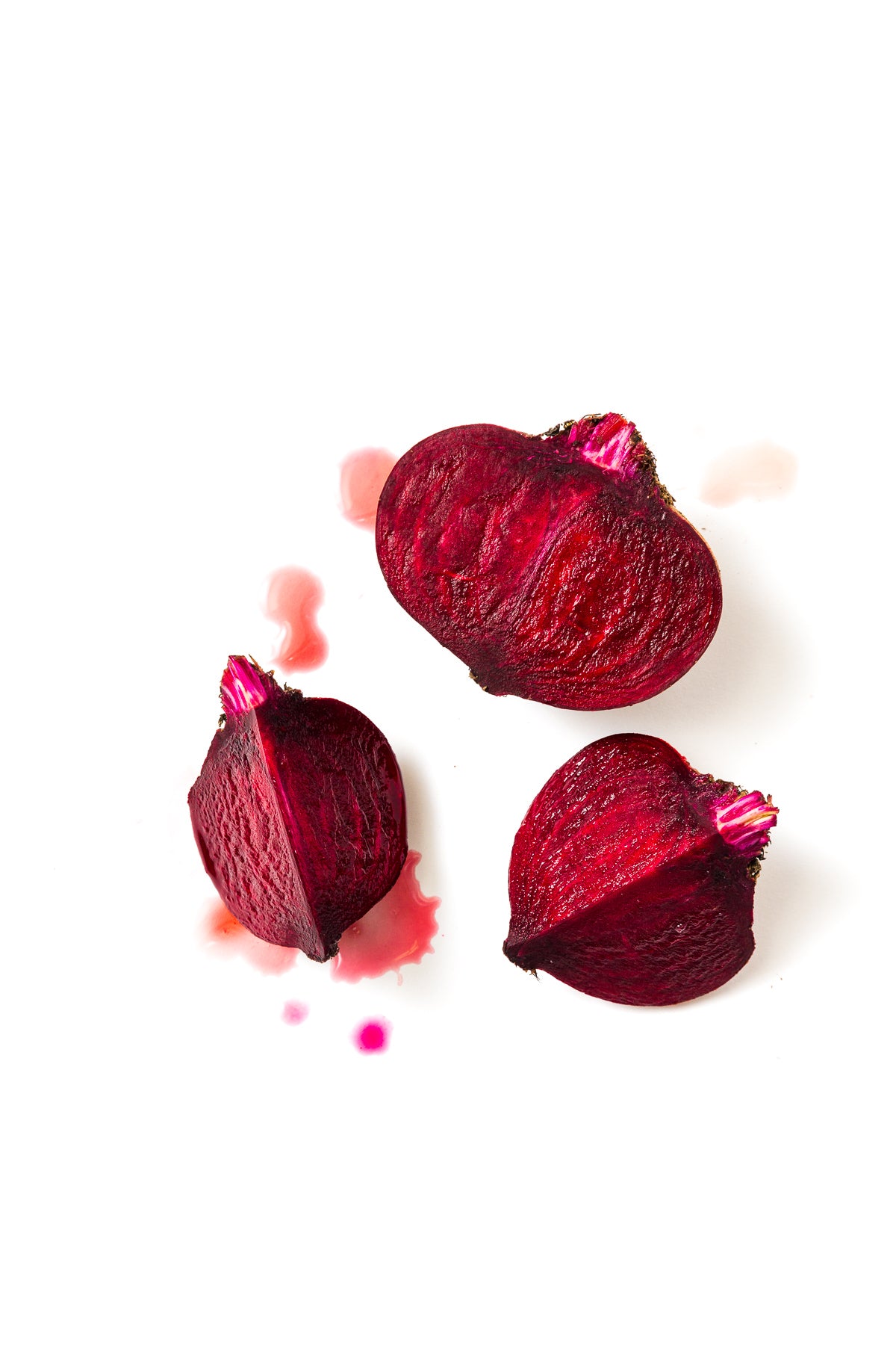 Image of top of three red beets used for Miss Jones Baking Co Beet Red Velvet Layer Cake