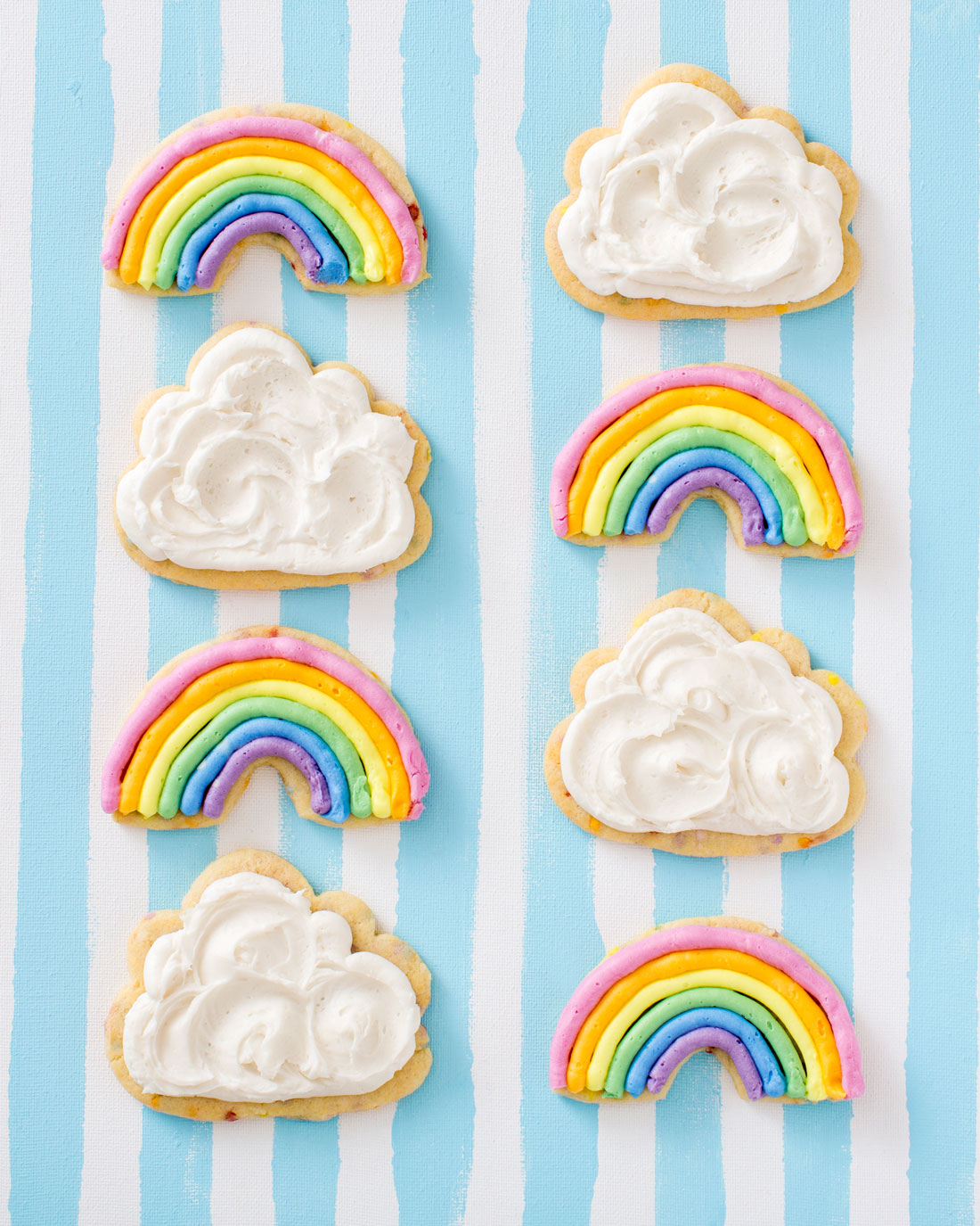 Image of eight Miss Jones Baking Co Chewy and Soft Rainbow and Cloud Frosted Confetti Sugar Cookies