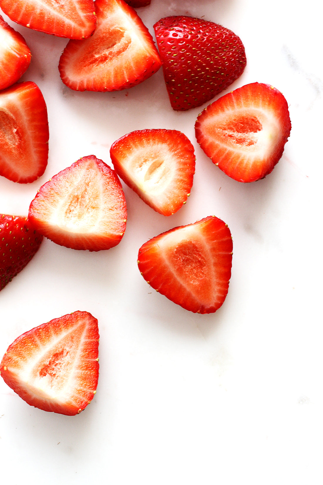 Close up image of strawberry halves for Miss Jones Baking Co California Strawberry Cake