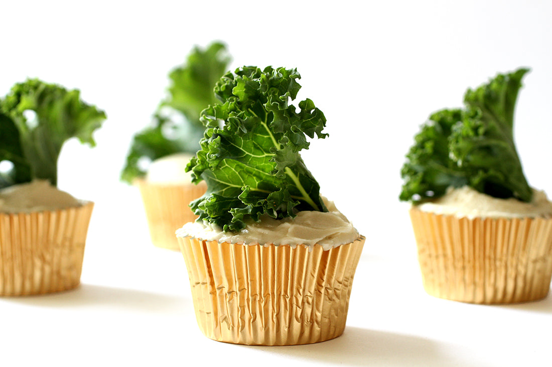 Image of the side of four Miss Jones Baking Co Sweet Kale Cupcakes