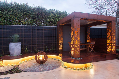 Custom made Pergola out of Laser cut corten with custom curve bench 
