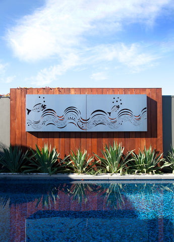 Outdoor Stainless Steel Wall Art on a Pool Wall