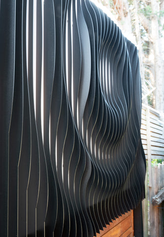 Parametric Wall Art in a small courtyard 