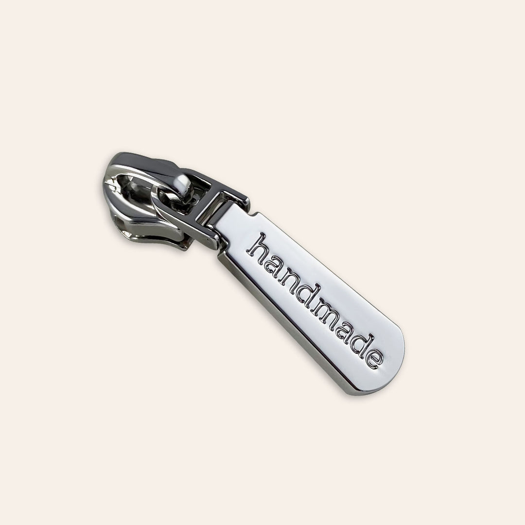 Limited Edition #5 Zipper Pull