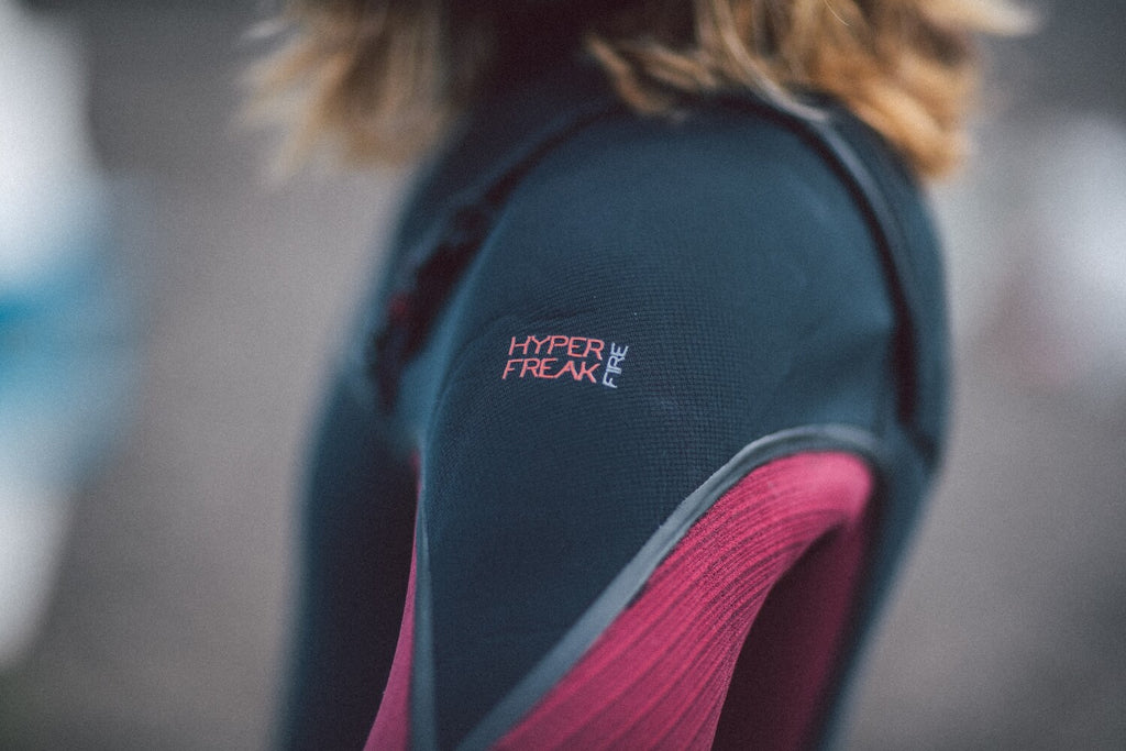 Shoulder view of man wearing an O'Neill Hyperfreak Fire Wetsuit