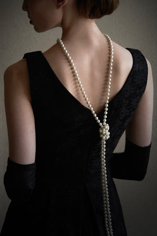 women wearing pearl