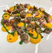 Polpo di Sardegna, spuma di carote, salsa al prezzemolo, lenticchie fritte e foglia di cappero di Pantelleria