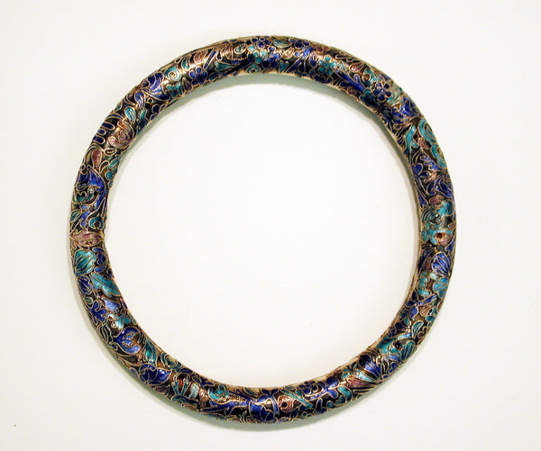 An example of a cloisonné bangle in shades of blue, orange, and pink. (Arthur M. Sackler Gallery, Smithsonian Institution)