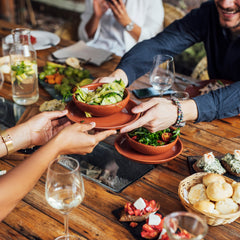 People sharing food in a restaurant