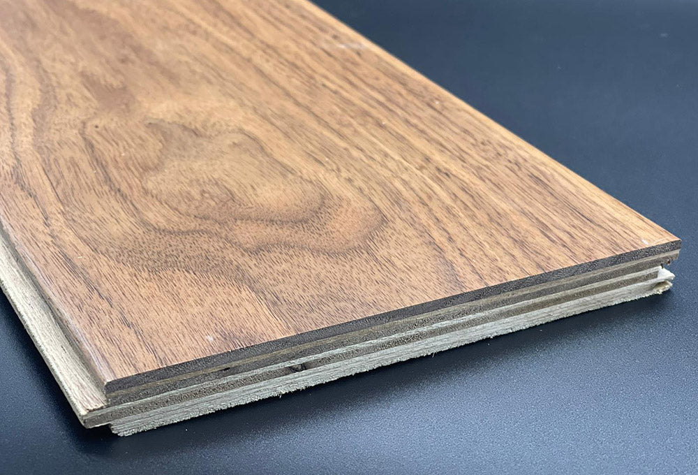 How is engineered wood flooring made?
