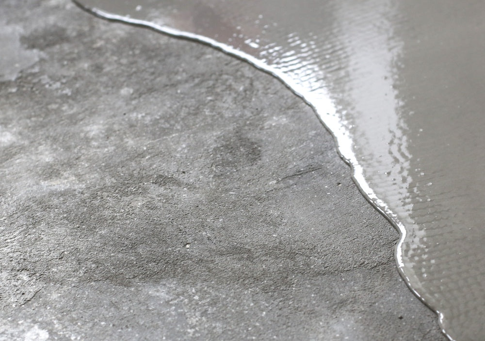 Preparing a subfloor using a compound