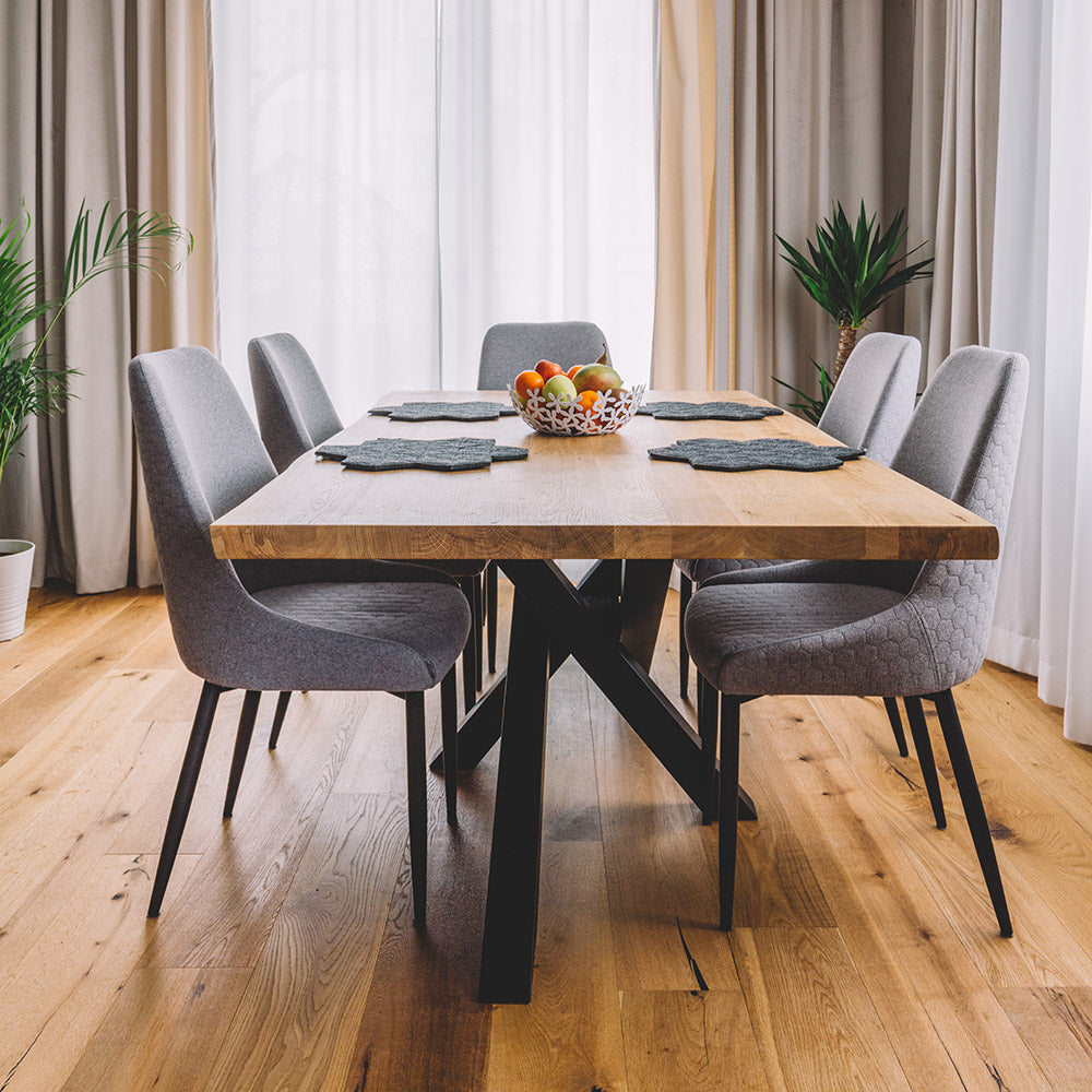 Solid Wood Floors Vs Laminate Floors - Hardwood Flooring Installed in a Dining Room