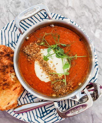 Vegetable Soup Served With Velvet Cloud Yogurt and Dukkah