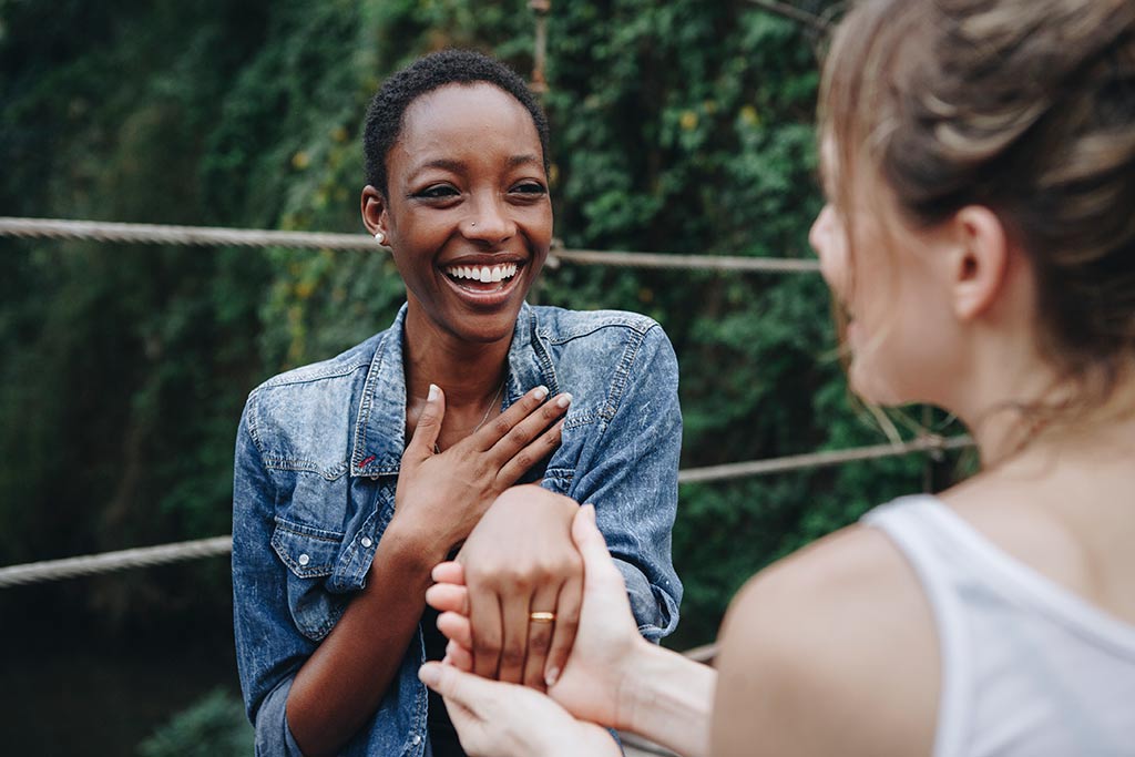 Woman proposing to girlfriend