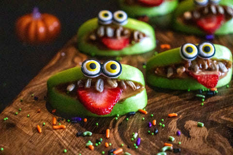 image of halloween decorated caramel apples