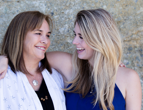 Mom and Daughter laughing together