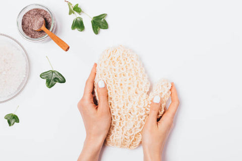 Exfoliating gloves and scrub for the hands