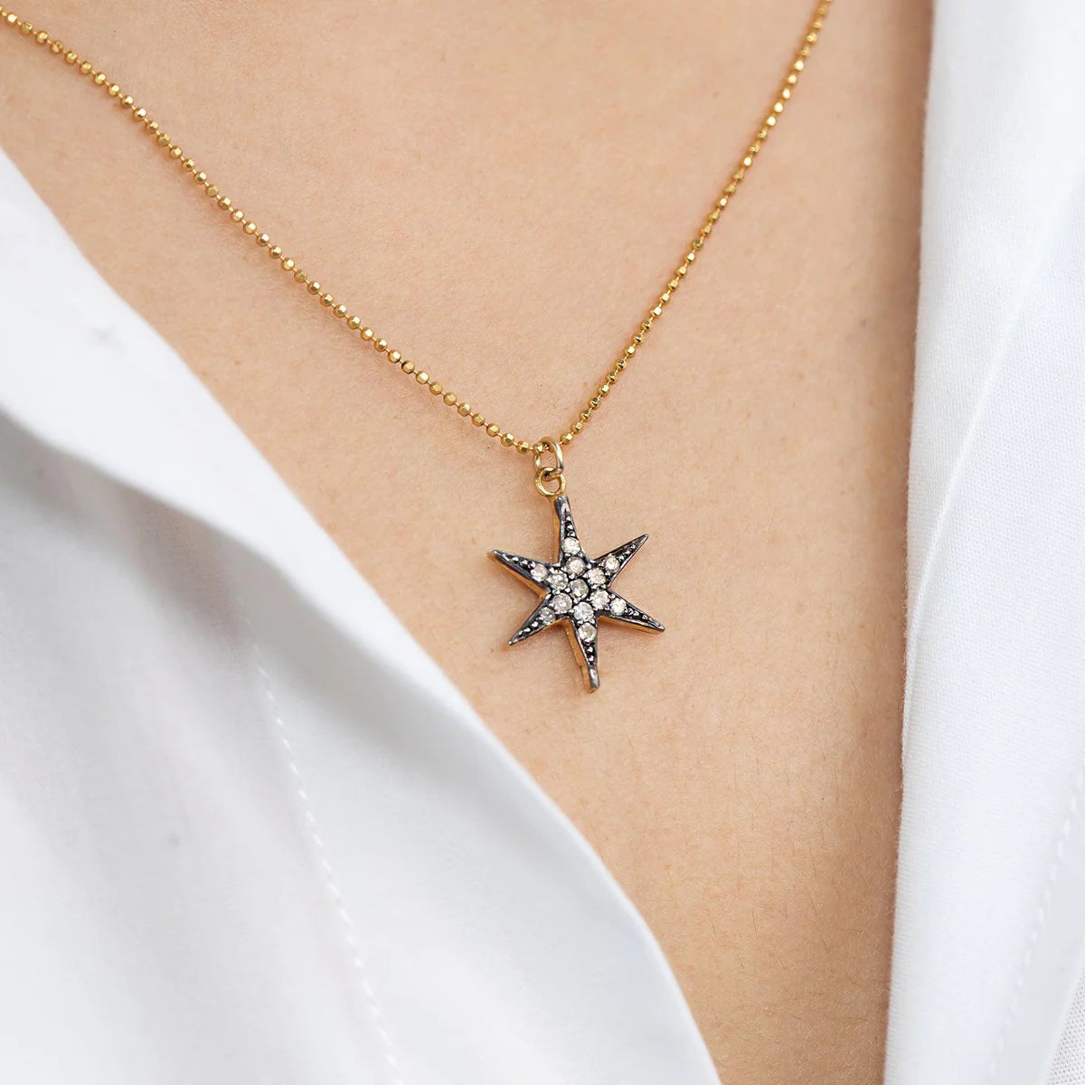 NEW-cosmic-star-necklace-GOLD_1200x.webp__PID:88117745-5593-4fdc-8944-5d02c0e9995e