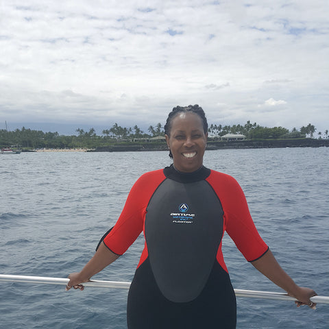 Lisa Robinson uses her Floater wetsuit in Hawaii to swim without fear