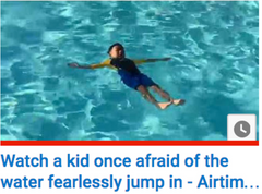 Watch kid fearlessly jump in the water