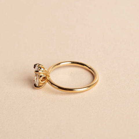 Vivienne, By Baby signature setting, signature tulip detailing, solid 18ct gold, oval cut diamond.