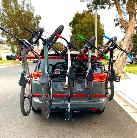 Minivan with 5 bikes on vertical bike rack