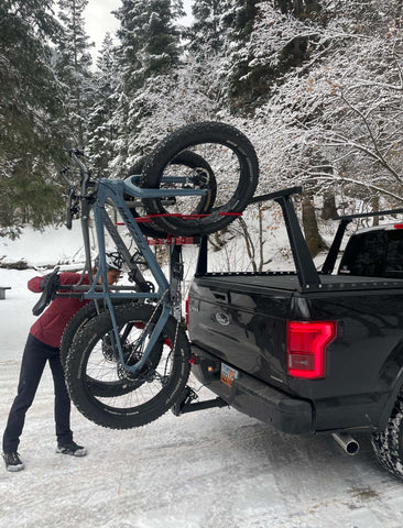 Fat tire bikes on bike rack in the snow