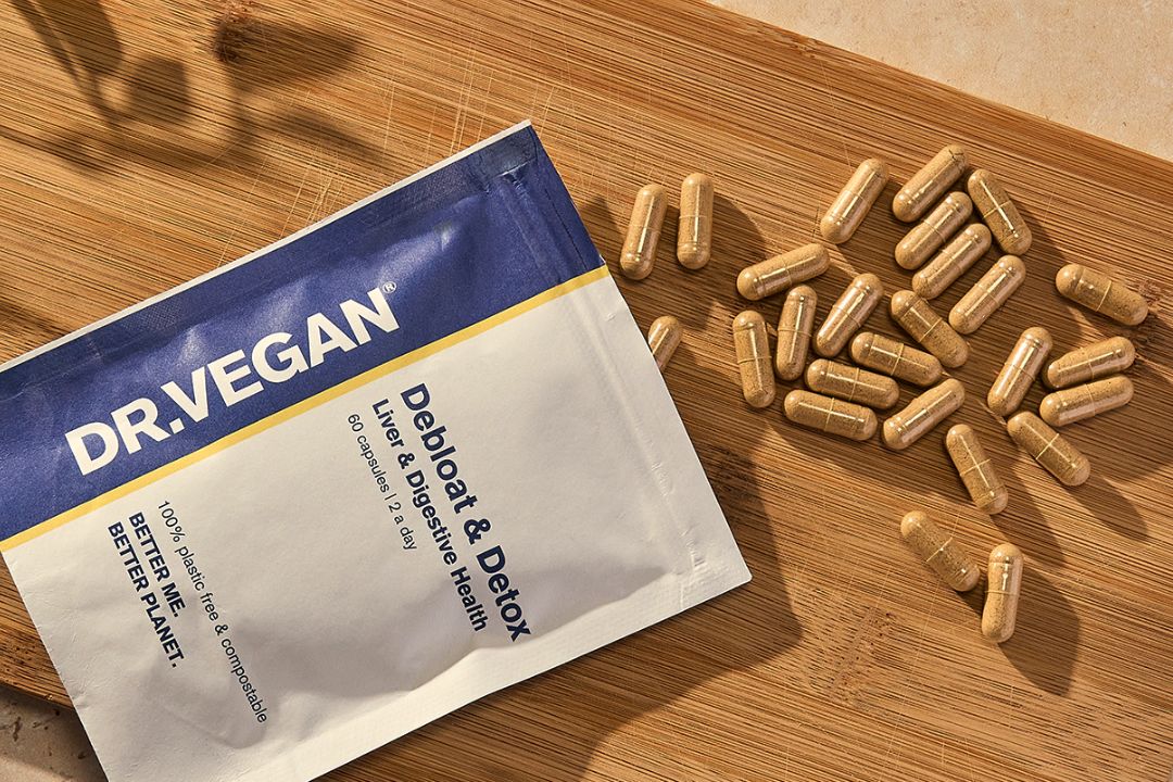 DR.VEGAN Vegan Supplements on a wooden board