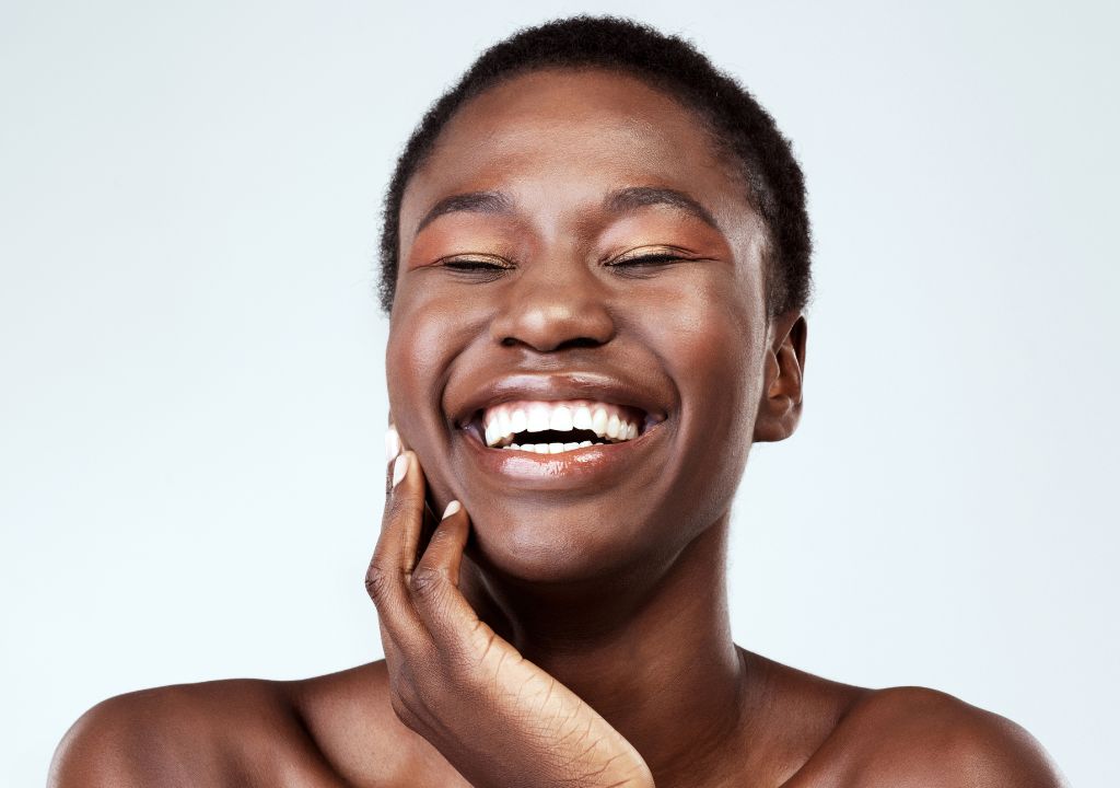 lady with black skin smiling