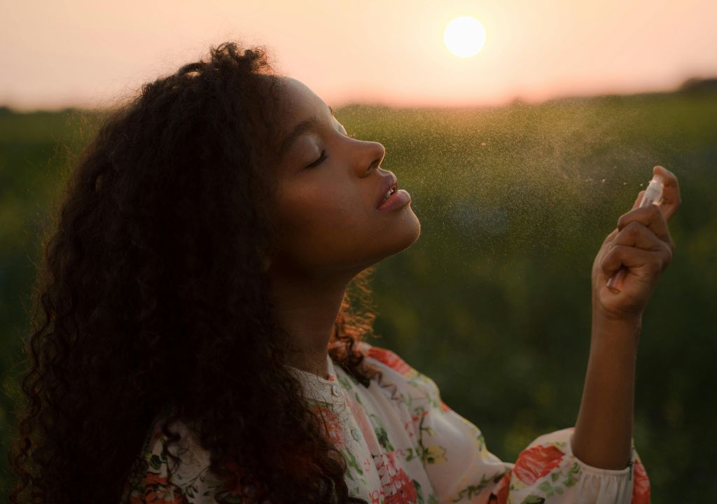 lady using a face mist