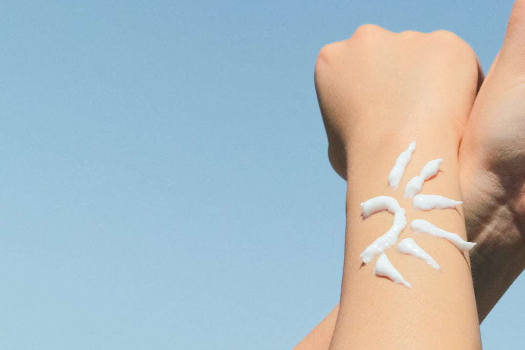 Sunscreen on woman's arm