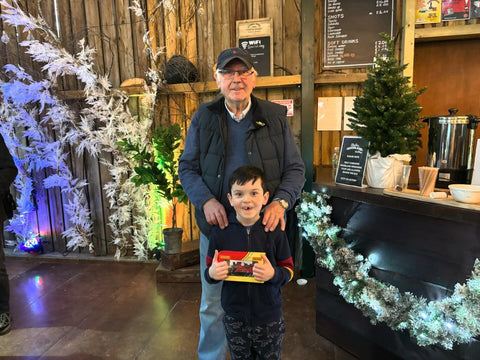 Image - Pete Waterman with very excited young model train enthusiast at Making Tracks at Blakemere, Dec 2023