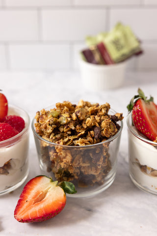 close-up-cup-of-chocolate-covered-granola-with-strawberry