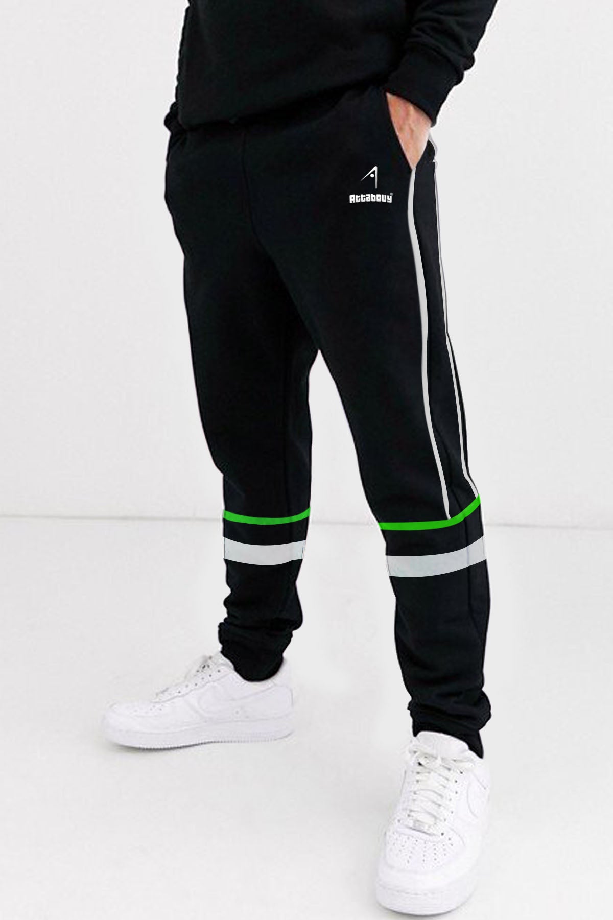 black joggers with green stripe