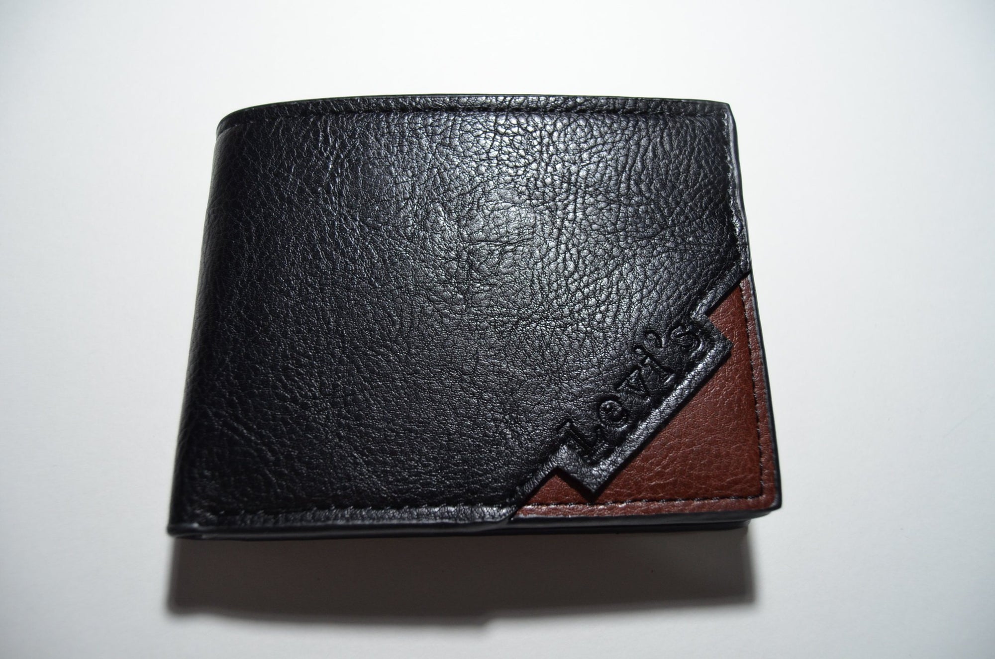 Shop wallets for men crafted with genuine leather in brown or black from  brands like Levi's Perry Ellis and Timberland. From slim, small… | Instagram