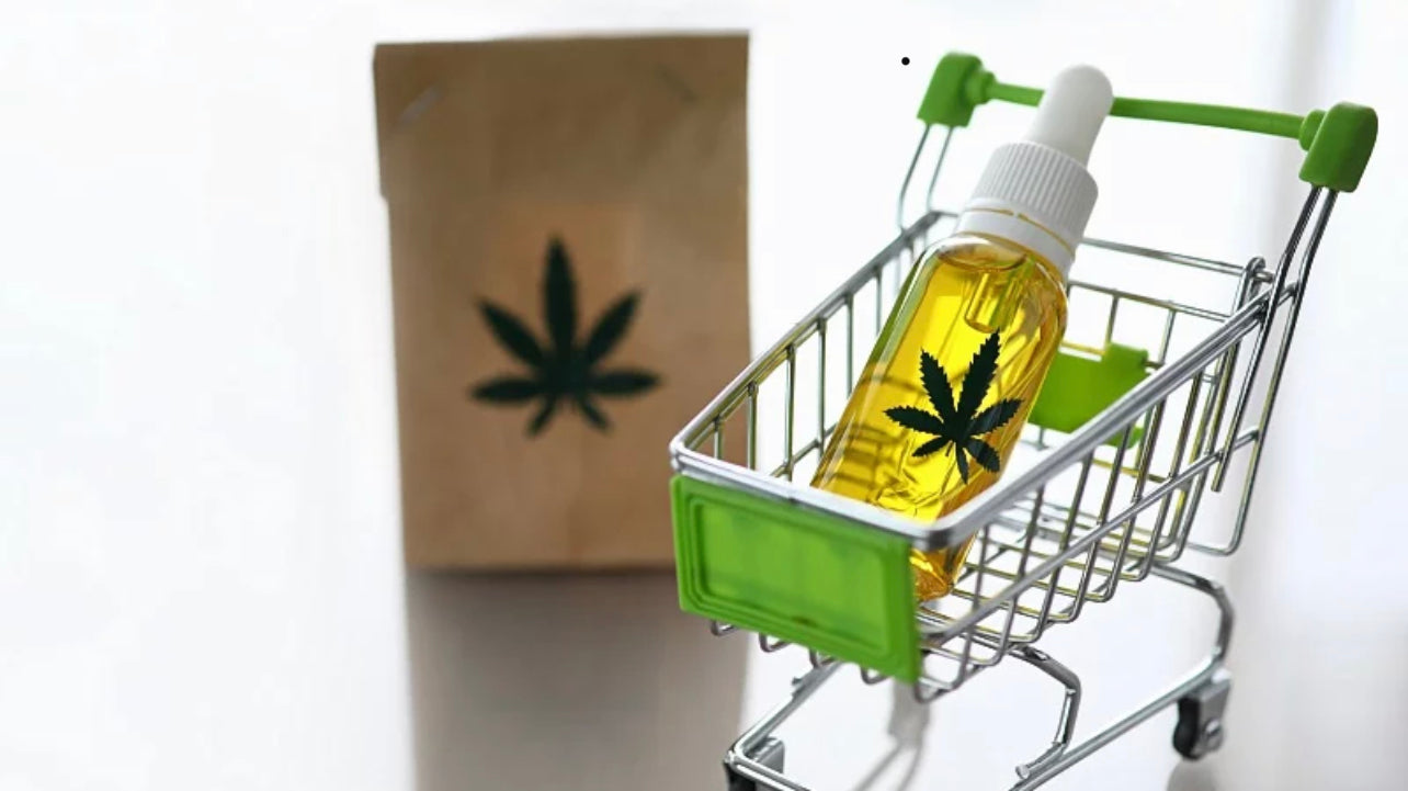 Cannabis oil on a cart and a paper bag