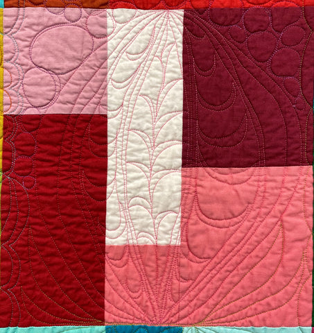 Colored Happy Quilt Red Block Close Up