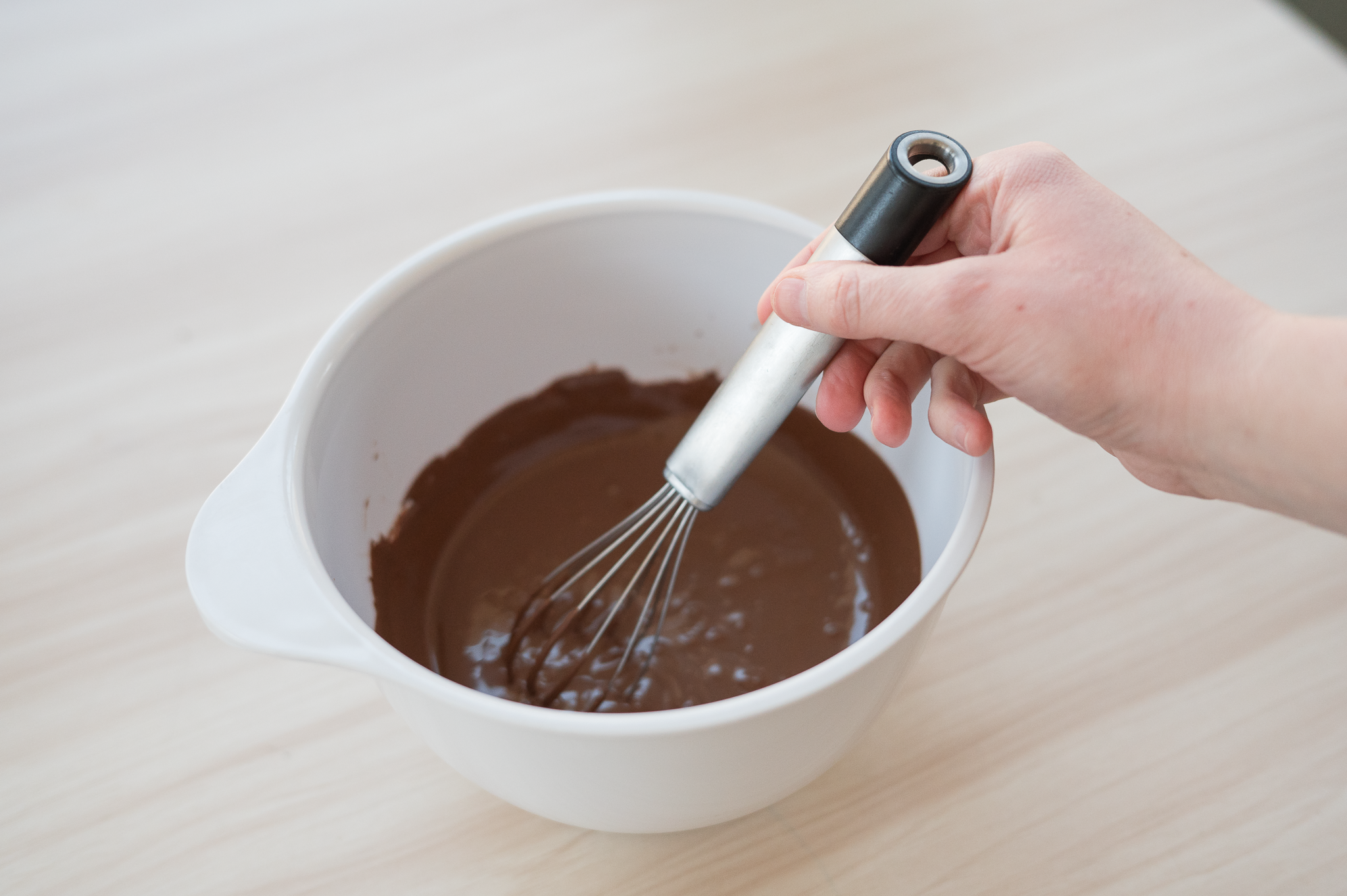 stirring chocolate with whisk