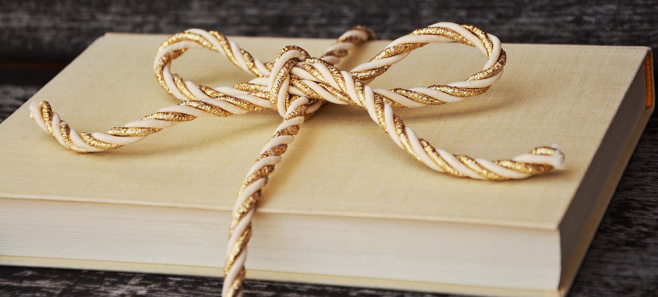 Rope bow on a closed book