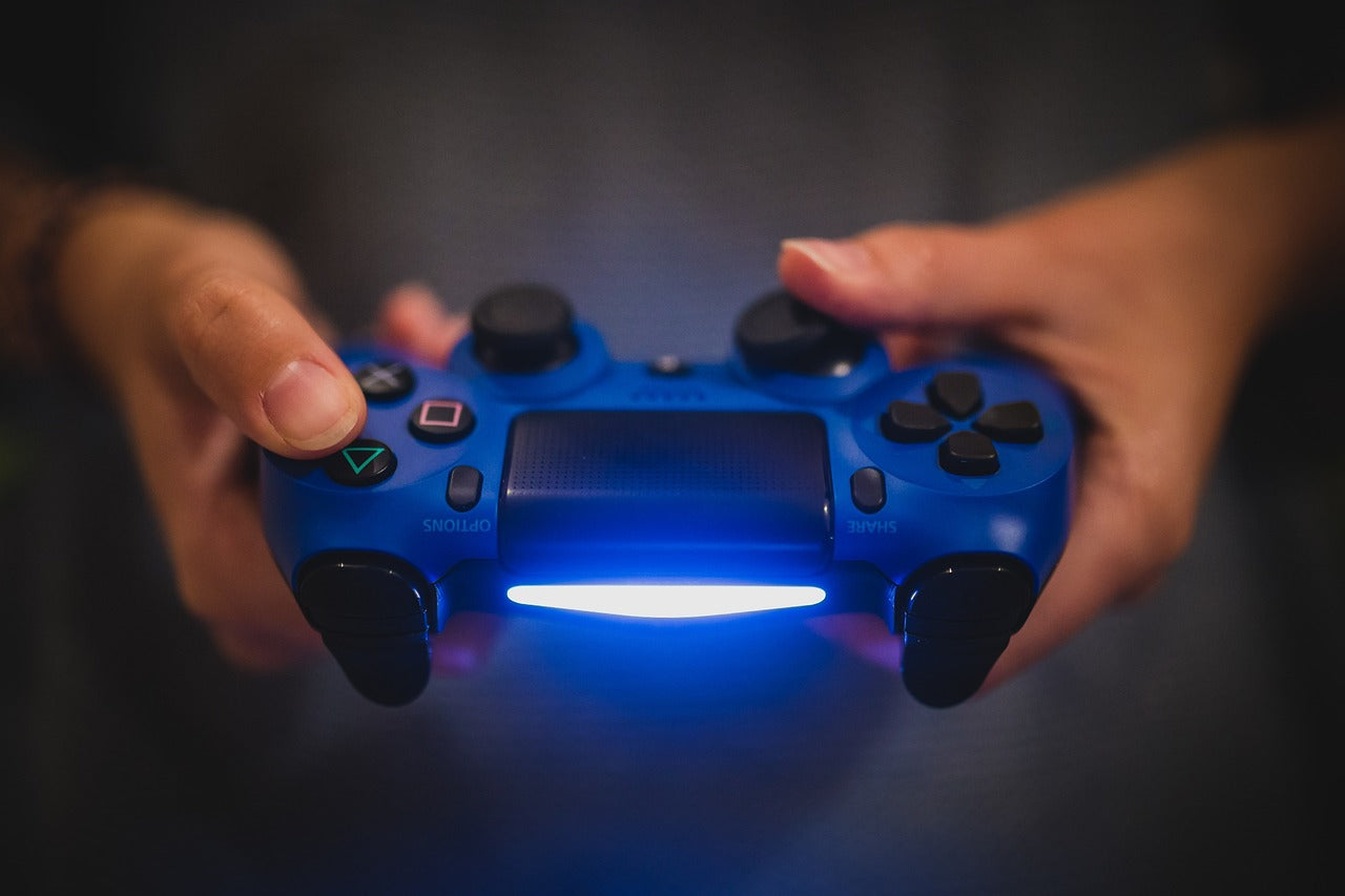 Blue joystick in hands