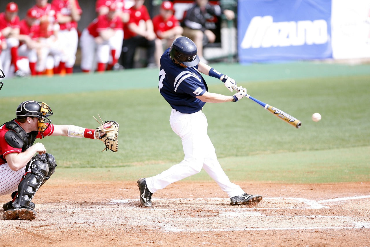 Baseball player hitting the ball