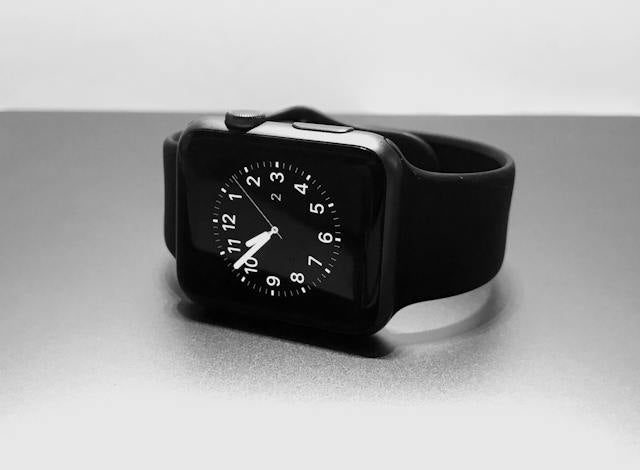 Black wristwatch with white dial